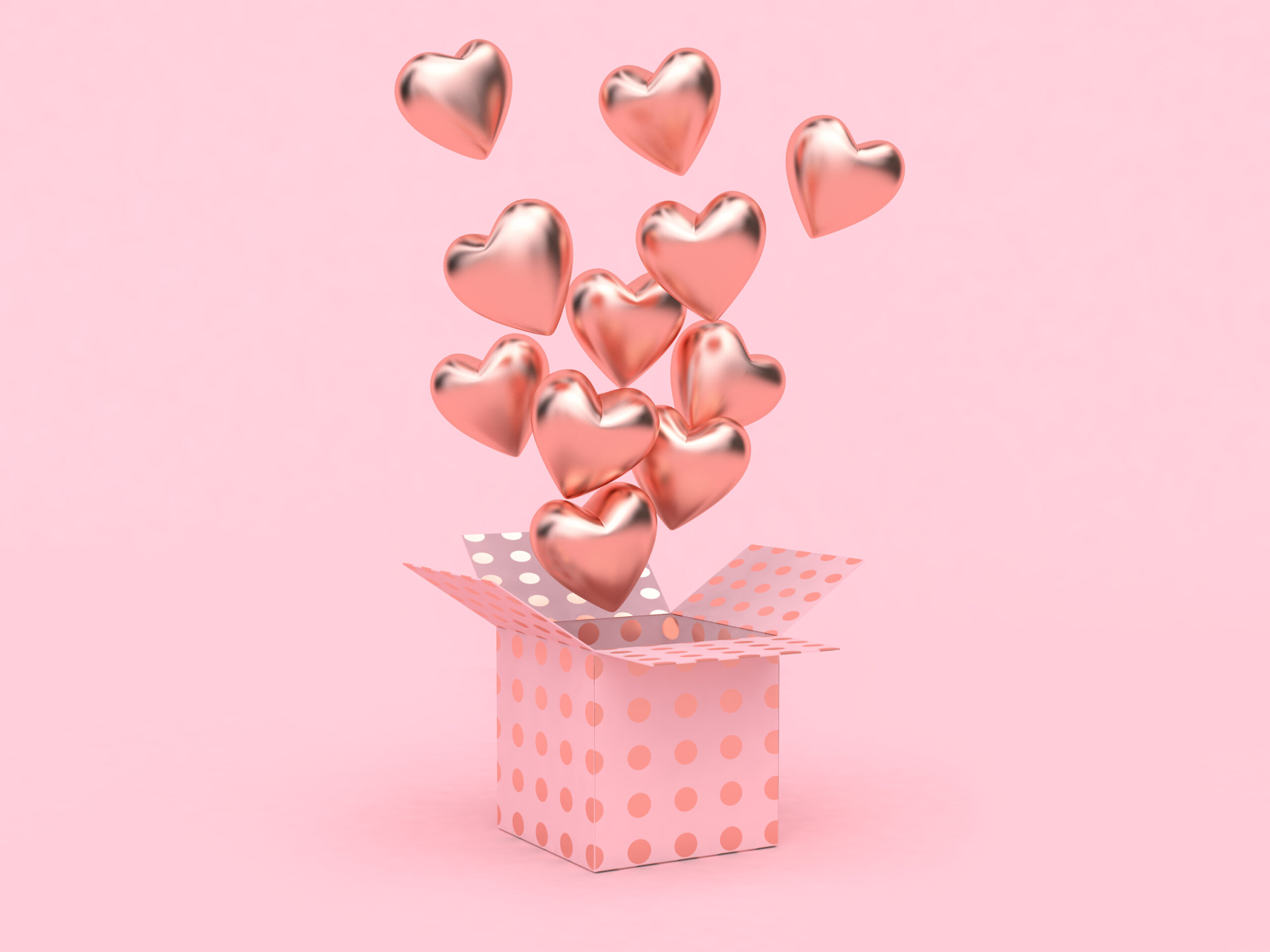 Balões de corações rosa saindo de dentro de uma caixa também rosa